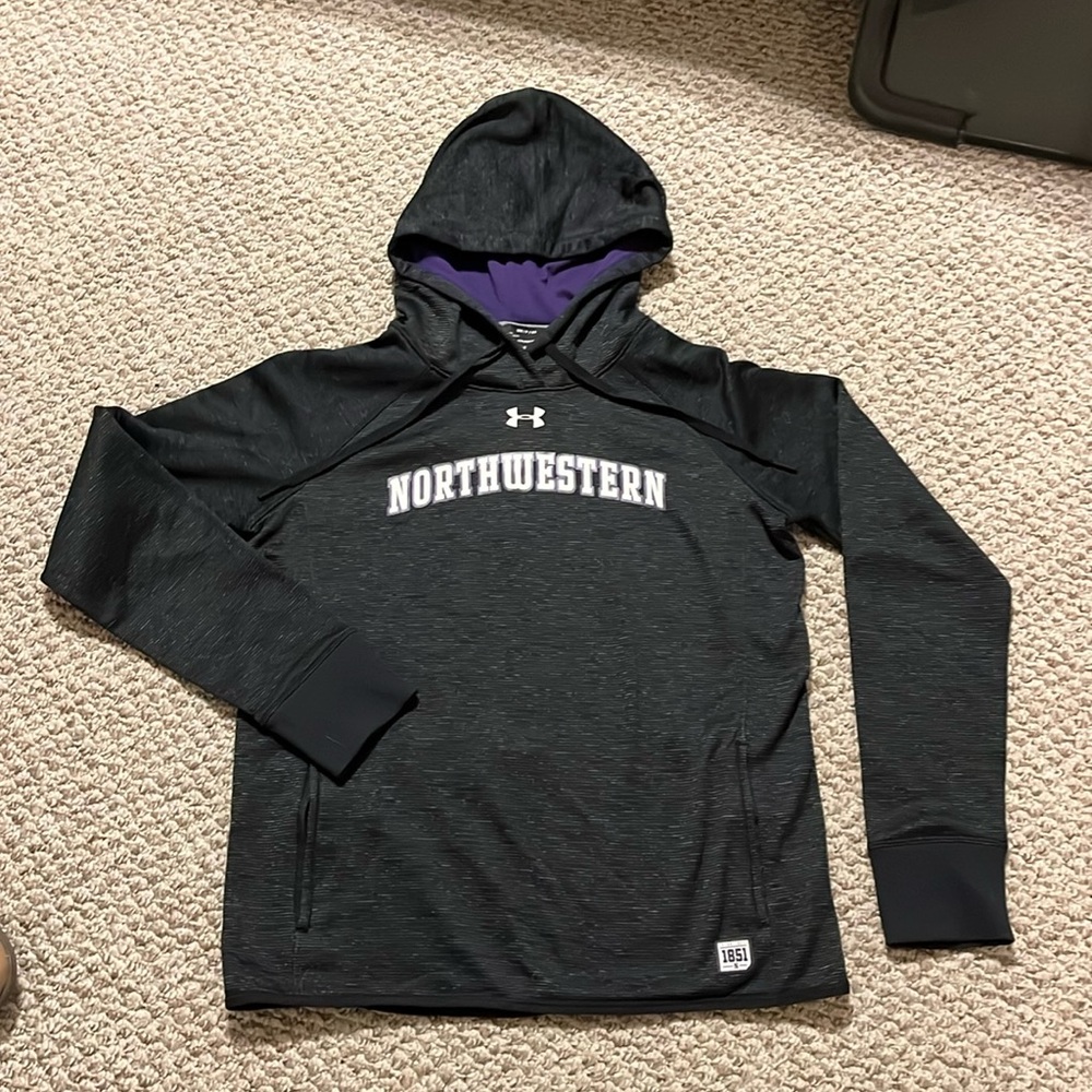Northwestern Under Armour women’s hooded sweatshirt with thumb holes.